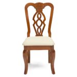 wooden chair with bent legs