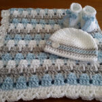 a blanket and a hat for a baby