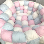 marshmallow blanket in the crib of a newborn