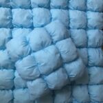 bonbon pillow and blanket