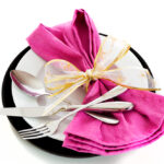 pink bow on a plate