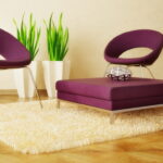 beige carpet and purple furniture