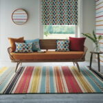 striped carpet near the sofa