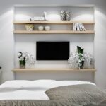 shelves above the bed