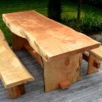 wooden furniture from logs in the garden area