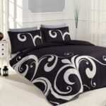 black bedding with ornament